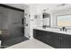 Spa-like bathroom with marble shower and double vanity at 100 W Northern Ave # 2, Phoenix, AZ 85021