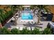 Resort-style pool with lounge chairs and private cabanas at 100 W Northern Ave # 2, Phoenix, AZ 85021