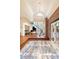 Bright and spacious entryway with a grand staircase and elegant floor at 341 E Monte Vista Rd, Phoenix, AZ 85004