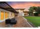 Stunning backyard with a wooden deck, pergola, and lush lawn at 341 E Monte Vista Rd, Phoenix, AZ 85004
