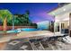 Modern pool and patio with lounge chairs and access to indoor spaces at 341 E Monte Vista Rd, Phoenix, AZ 85004