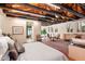 Spacious main bedroom with wood floors, high ceilings, and a sitting area at 341 E Monte Vista Rd, Phoenix, AZ 85004