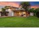 Expansive backyard with modern home and lush lawn at 341 E Monte Vista Rd, Phoenix, AZ 85004