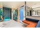 Spa-like bathroom with a shower, reclaimed wood lockers, and bench at 341 E Monte Vista Rd, Phoenix, AZ 85004