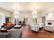 Elegant living room with hardwood floors, fireplace, and large windows at 341 E Monte Vista Rd, Phoenix, AZ 85004