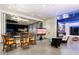 Indoor dining area with access to outdoor patio and TV at 341 E Monte Vista Rd, Phoenix, AZ 85004