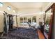 Home gym with various exercise equipment and large mirrors at 341 E Monte Vista Rd, Phoenix, AZ 85004