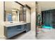 Modern bathroom with double vanity and walk-in shower at 341 E Monte Vista Rd, Phoenix, AZ 85004
