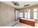 Spa-like bathroom with a freestanding tub and walk-in shower at 341 E Monte Vista Rd, Phoenix, AZ 85004
