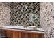 Unique powder room with decorative tile and vessel sink at 341 E Monte Vista Rd, Phoenix, AZ 85004