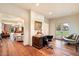 Home office with hardwood floors, built-in desk and French doors at 341 E Monte Vista Rd, Phoenix, AZ 85004