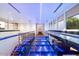 Unique glass walkway with blue lighting and modern features at 341 E Monte Vista Rd, Phoenix, AZ 85004