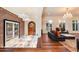 Elegant living room featuring hardwood floors, a fireplace, and comfortable seating at 341 E Monte Vista Rd, Phoenix, AZ 85004