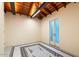 Bright bonus room featuring wood beamed ceilings and unique tile flooring at 341 E Monte Vista Rd, Phoenix, AZ 85004