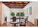 Open sitting area with hardwood floors, high ceilings and natural light at 341 E Monte Vista Rd, Phoenix, AZ 85004
