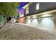 Modern home with three-car garage and paved driveway at 341 E Monte Vista Rd, Phoenix, AZ 85004