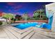 Large resort-style pool and spa with a waterfall feature and ample seating at 341 E Monte Vista Rd, Phoenix, AZ 85004