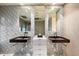 Stylish bathroom with patterned tile, dual sinks, and modern fixtures at 341 E Monte Vista Rd, Phoenix, AZ 85004