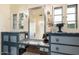 Vintage-inspired bathroom with a marble vanity and built-in cabinets at 341 E Monte Vista Rd, Phoenix, AZ 85004
