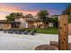 Expansive backyard with luxurious pool, lounge chairs, and modern architectural details at 341 E Monte Vista Rd, Phoenix, AZ 85004