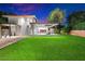 Spacious backyard with lush lawn and modern home at 341 E Monte Vista Rd, Phoenix, AZ 85004