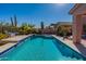 Large inviting swimming pool, perfect for cooling off on a hot day at 4333 S Pony Rider Trl, Gold Canyon, AZ 85118