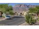 Residential street with mountain backdrop and desert landscaping at 4333 S Pony Rider Trl, Gold Canyon, AZ 85118