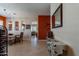 Bright dining area with wooden table and chairs, adjacent to living room at 4333 S Pony Rider Trl, Gold Canyon, AZ 85118