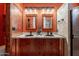 Bathroom with double vanity, copper sinks, and a walk-in shower at 4333 S Pony Rider Trl, Gold Canyon, AZ 85118