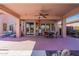 Large covered patio, pool access, and outdoor seating at 4333 S Pony Rider Trl, Gold Canyon, AZ 85118