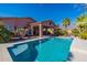 Sparkling blue pool with a spacious deck and mountain views at 4333 S Pony Rider Trl, Gold Canyon, AZ 85118