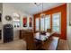 Southwest-themed dining area with wooden table and chairs at 4333 S Pony Rider Trl, Gold Canyon, AZ 85118