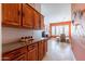 Butlers pantry with wood cabinets and granite countertops at 4333 S Pony Rider Trl, Gold Canyon, AZ 85118