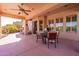 Covered patio with seating area and access to the pool at 4333 S Pony Rider Trl, Gold Canyon, AZ 85118