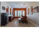 Rustic dining area with wooden table and wine rack at 4333 S Pony Rider Trl, Gold Canyon, AZ 85118