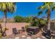 Private hot tub area with comfortable seating and desert landscaping at 4333 S Pony Rider Trl, Gold Canyon, AZ 85118