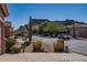 Residential street with mountain backdrop and desert landscaping at 4333 S Pony Rider Trl, Gold Canyon, AZ 85118