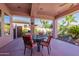 Covered patio with seating area and mountain views at 4333 S Pony Rider Trl, Gold Canyon, AZ 85118