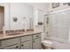 Updated bathroom with a tub, shower, and vanity at 18119 W Narramore Rd, Goodyear, AZ 85338