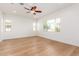 Bright and airy bedroom with hardwood floors and large windows at 3132 E Austin Dr, Gilbert, AZ 85296