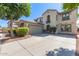 Two-story home with attached garage and curb appeal at 18337 W Stinson Dr, Surprise, AZ 85374