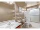 Bathroom features a single vanity, tub, and shower at 18337 W Stinson Dr, Surprise, AZ 85374