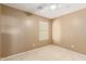 Bright bedroom with ceiling fan and window coverings at 18337 W Stinson Dr, Surprise, AZ 85374