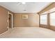 Main bedroom with large closet and ensuite bathroom at 18337 W Stinson Dr, Surprise, AZ 85374