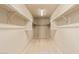 Spacious walk-in closet with ample shelving and hanging space at 18337 W Stinson Dr, Surprise, AZ 85374