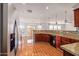Open kitchen with granite countertops and stainless steel appliances at 18337 W Stinson Dr, Surprise, AZ 85374