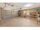 Garage with shelving and ample storage space at 18337 W Stinson Dr, Surprise, AZ 85374