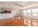 Open living area with kitchen island and hardwood floors at 18337 W Stinson Dr, Surprise, AZ 85374