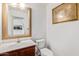 Small bathroom with single sink vanity and toilet at 18337 W Stinson Dr, Surprise, AZ 85374