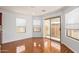 Bright breakfast nook with wood-look floors and backyard access at 18337 W Stinson Dr, Surprise, AZ 85374
